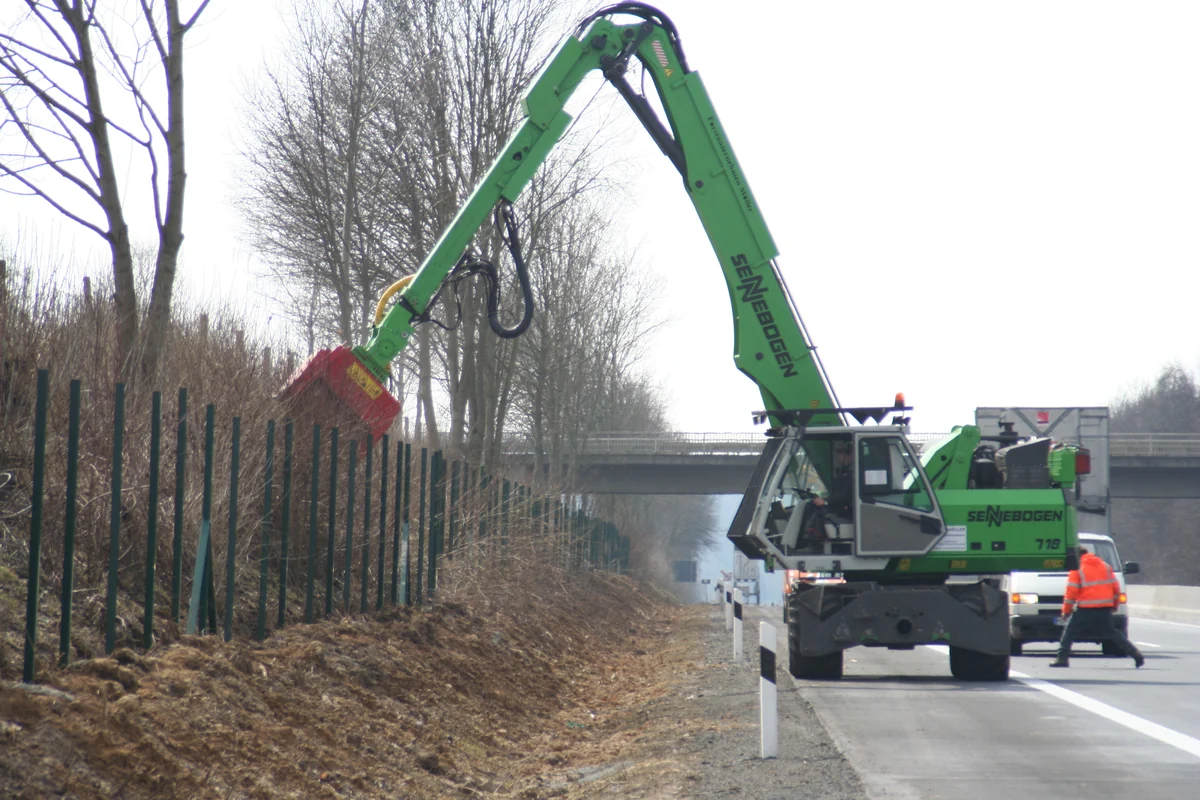 Excavator-mounted forestry mulcher used as representative equipment photography, not a Clear Path project